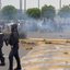 Imagem CONFUSÃO NA COPA! Manifestantes entram em conflito no entorno do estádio da estreia do mundial; veja