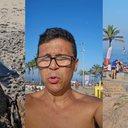 Corpo encontrado em praia em meio a naturalidade da reação das pessoas - Reprodução/Junior Alves