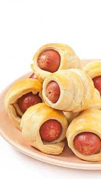 Receita de enroladinho de salsicha para comer rezando