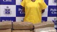 Imagem Mulher é presa com 20 quilos de maconha