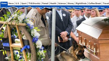 Imagem Foto de cão &quot;se despedindo&quot; de policial ganha as redes sociais