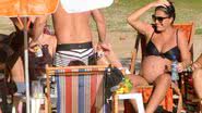 Imagem Juliana Paes vai à praia e exibe barrigão de oito meses. Veja fotos