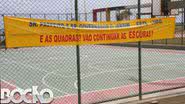 Imagem  Às escuras: população cobra luz em quadra. Prefeitura culpa Conder, que rebate