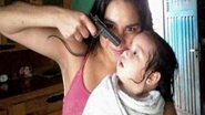 Imagem Foto de mulher apontando arma para bebê gera revolta no Facebook