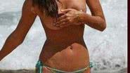 Imagem Irina Shayk mostra os peitos em ensaio, mas é flagrada por paparazzo. Veja