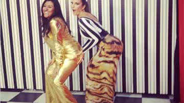 Imagem Ivete Sangalo posta foto dando uma conferida em Regina Casé