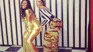 Imagem Ivete Sangalo posta foto dando uma conferida em Regina Casé