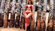 Imagem Lua-de-mel: Solange Almeida curte praia e exibe corpão 
