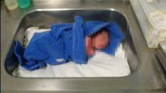 Imagem Bebê dorme em pia de hospital em Feira