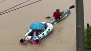 Imagem Canal transborda e pessoas precisam ser resgatadas de bote em Olinda; assista