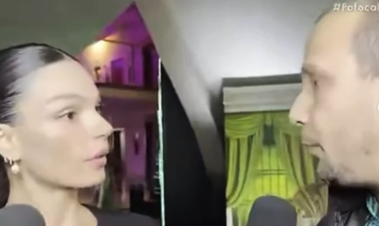 Foto: Reação de Isis Valverde ao ser questionada sobre processo | Reprodução: SBT