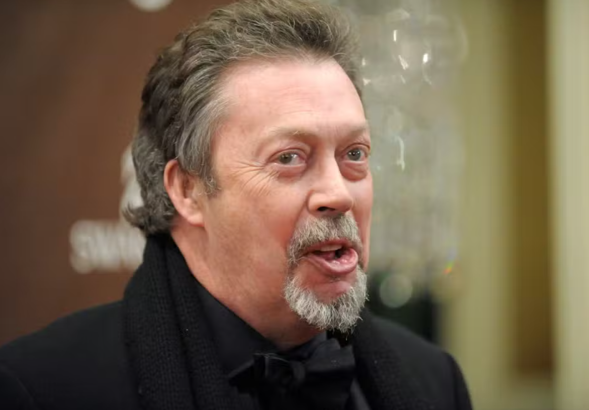Tim Curry, de 