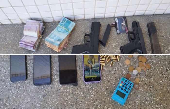 Materiais como uma pistola calibre 380, munições, um simulacro de arma de fogo, dinheiro e aparelhos celulares foram apreendidos. Foto: Divulgação/PM-BA