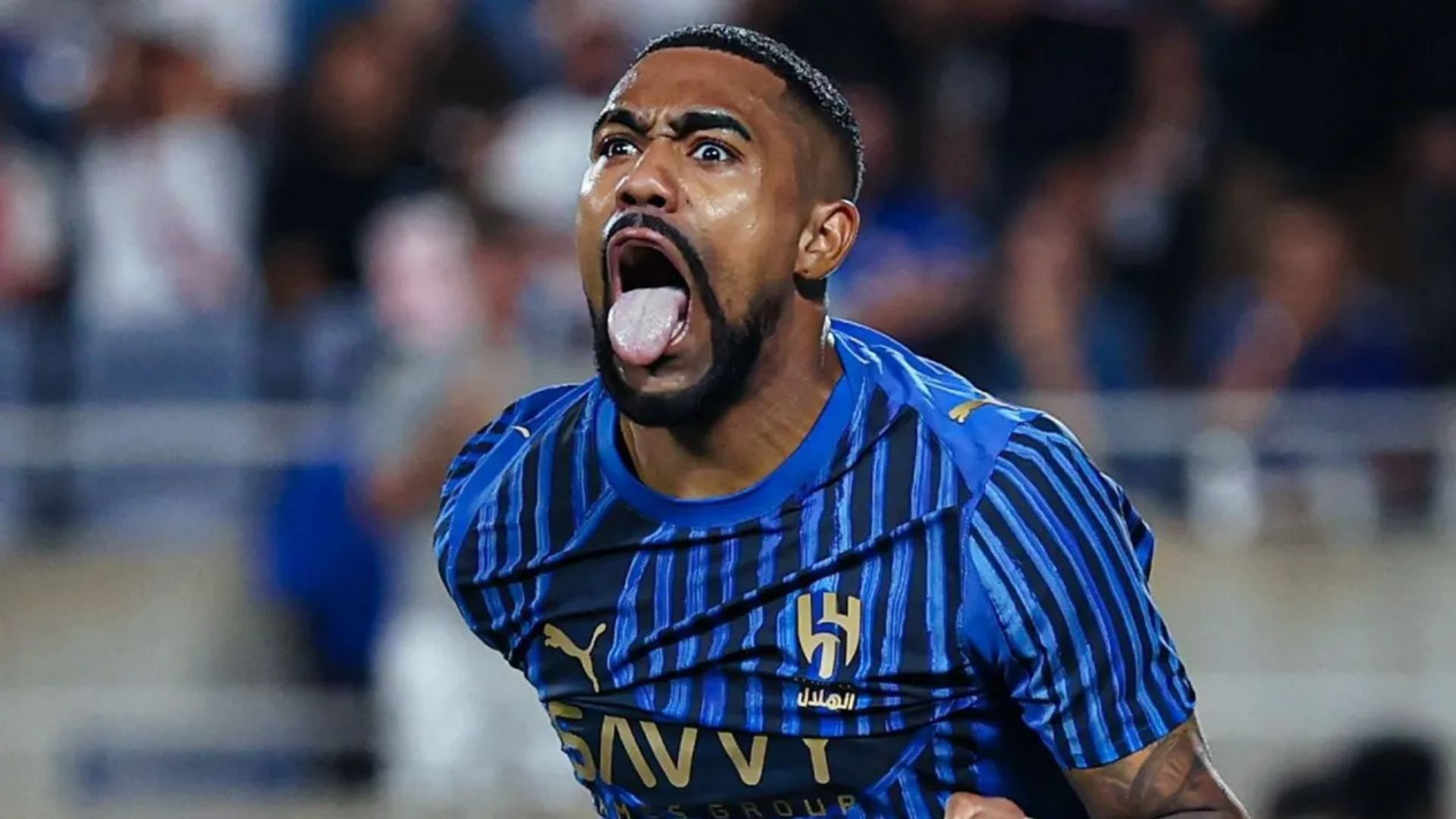 Malcom comemora gol contra o City
