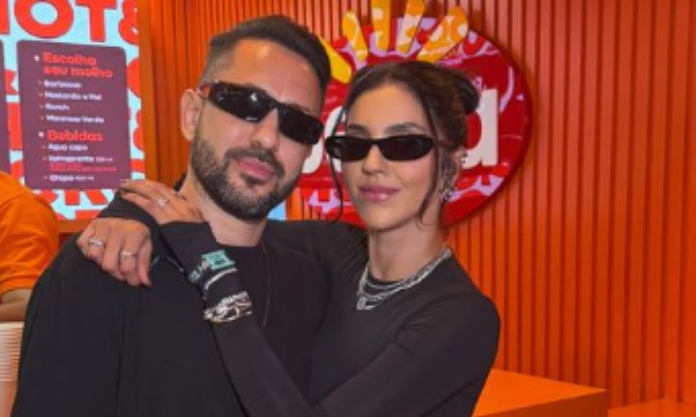Foto de Éverton Ribeiro com a esposa no Rock in Rio 2024