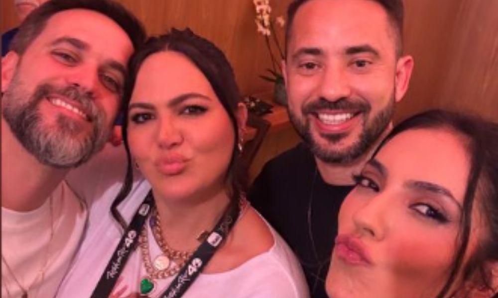 Foto de Éverton Ribeiro com a esposa com alguns amigos no Rock in Rio 2024
